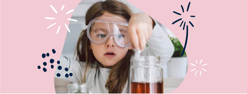 image of a girl performing a science experiment